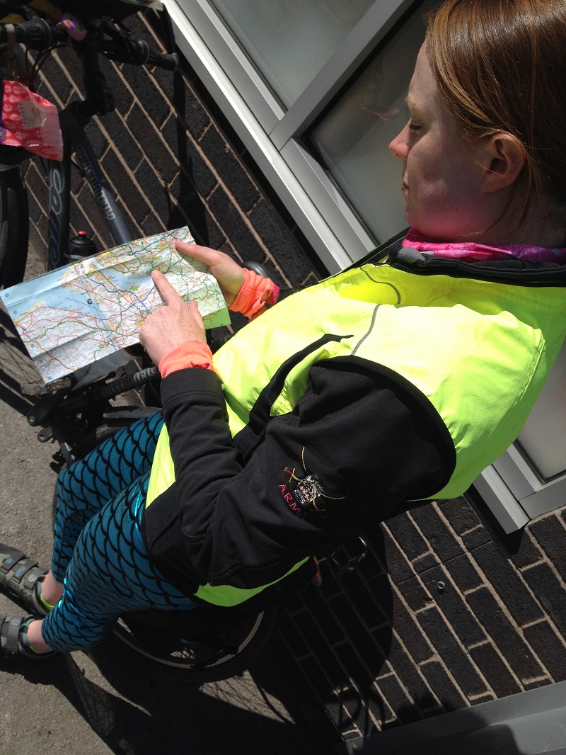 Sarah navigating with a road map for cycling
